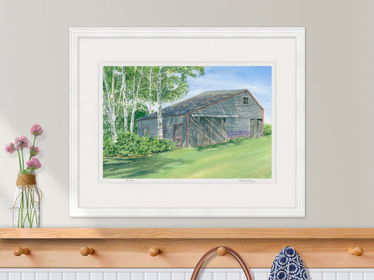 Framed watercolor print of Birches, weathered barn and paper birch trees, Friendship, Maine, in a lifestyle setting with dried flowers.