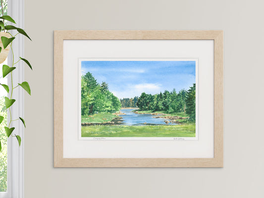 Framed watercolor print of Carrying Place, Machias, Maine, in a warm wood frame with plant styling.