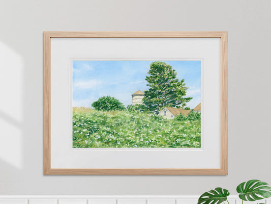 Framed original watercolor painting of Laudholm Farm Wildflowers in a warm wood frame.