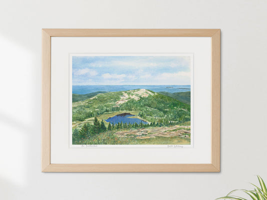 Framed watercolor print of The Featherbed, Cadillac Mountain, Acadia National Park, in a warm wood frame on a neutral wall.