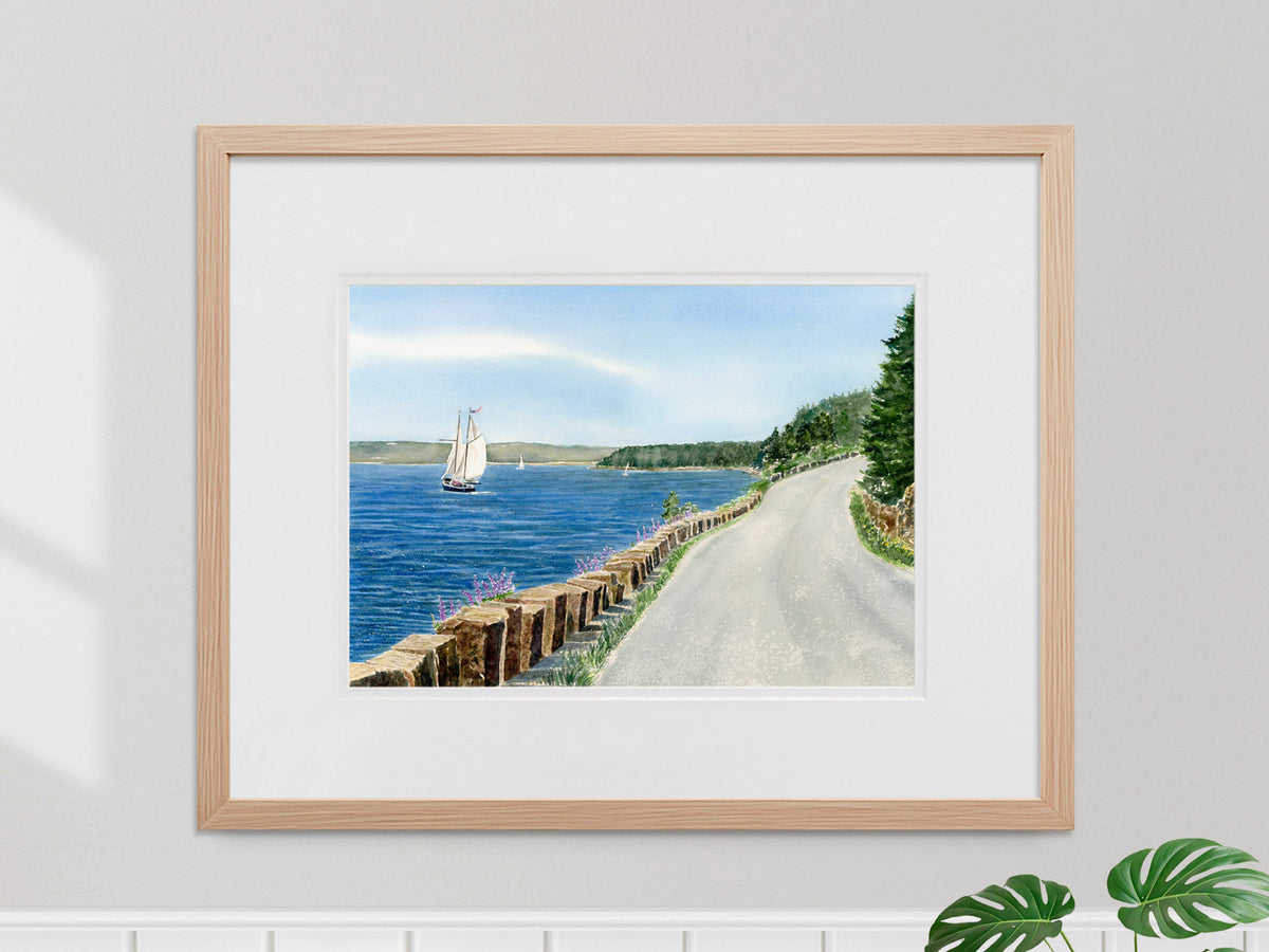 Framed original watercolor painting of Sailing on the Sound, Somes Sound, Maine, in a warm wood frame in a coastal style home decor.