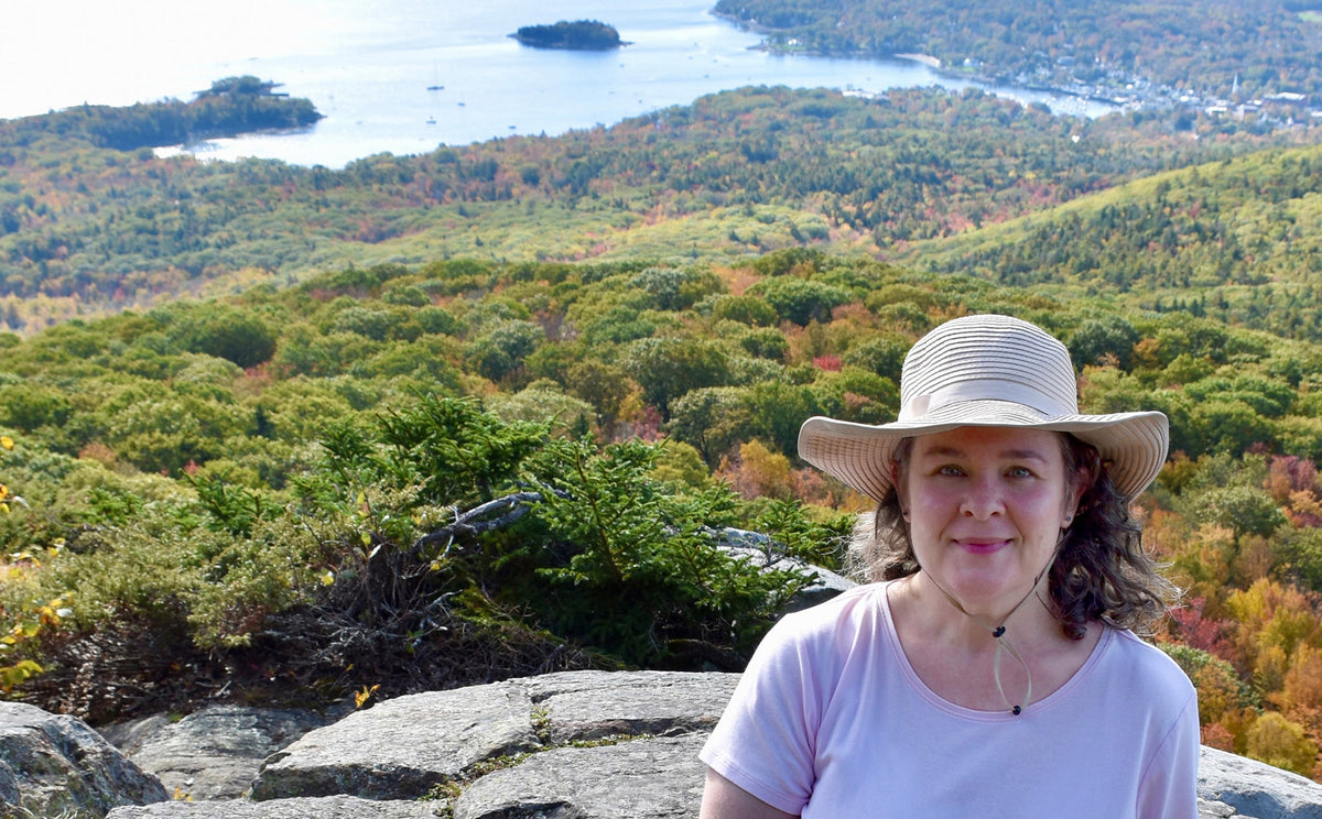Maine Artist Beth Whitney hiking in Camden Hills State Park.