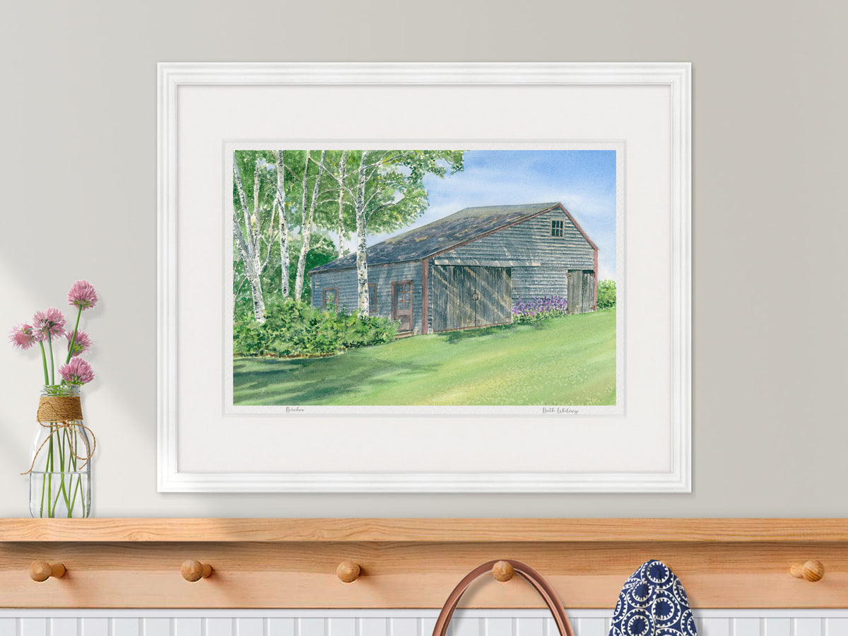 Framed watercolor print of Birches, weathered barn and paper birch trees, Friendship, Maine, in a lifestyle setting with dried flowers.