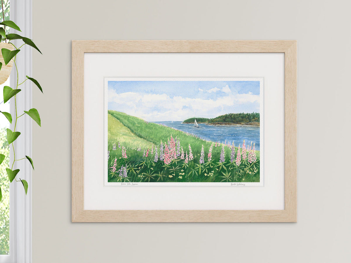 Framed watercolor print of Deer Isle Lupine, Deer Isle, Maine, in a warm wood frame with plant styling.