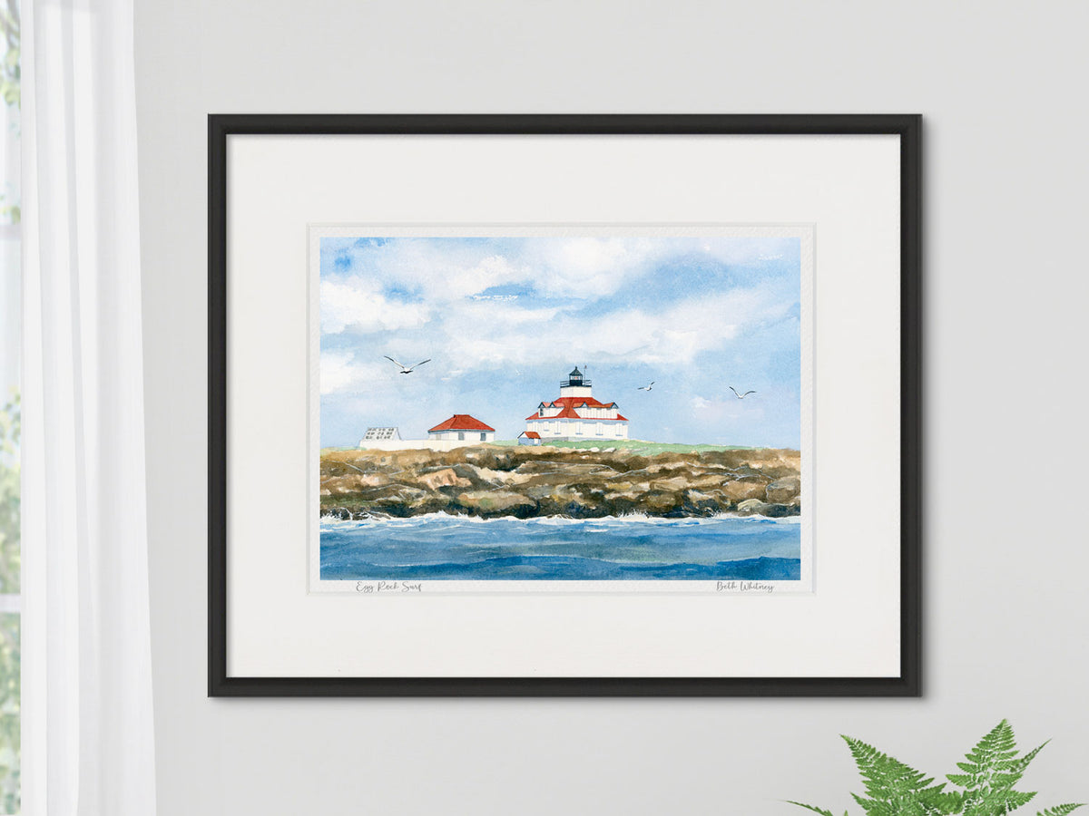 Framed watercolor print of Egg Rock Surf in a black frame on a neutral wall.