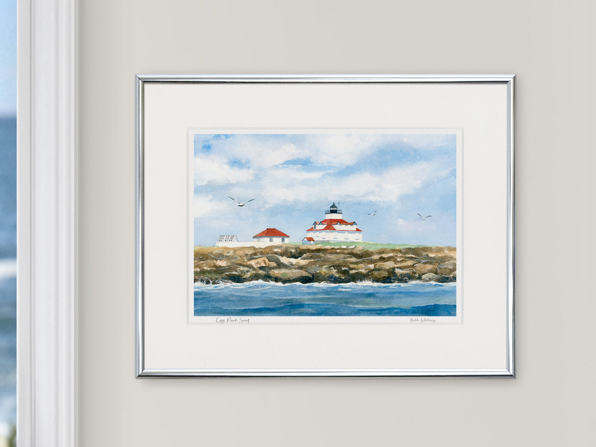 Framed watercolor print of Egg Rock Surf, Frenchman's Bay, in a white frame on a neutral wall.