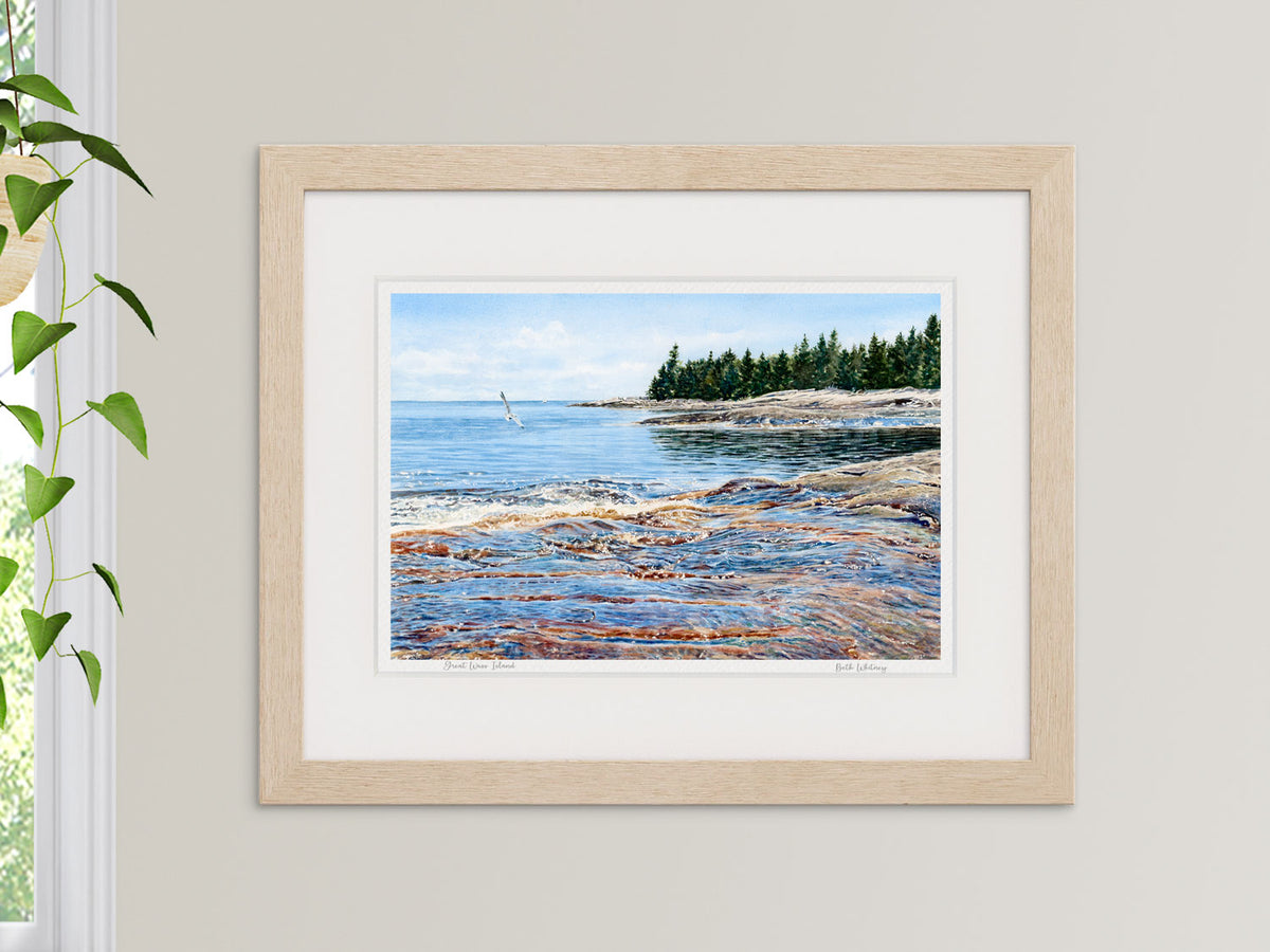 Framed watercolor print of Great Wass Island, Beals, Maine, in a warm wood frame with plant styling.