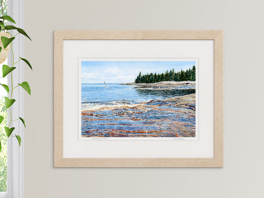 Framed watercolor print of Great Wass Island, Beals, Maine, in a warm wood frame with plant styling.