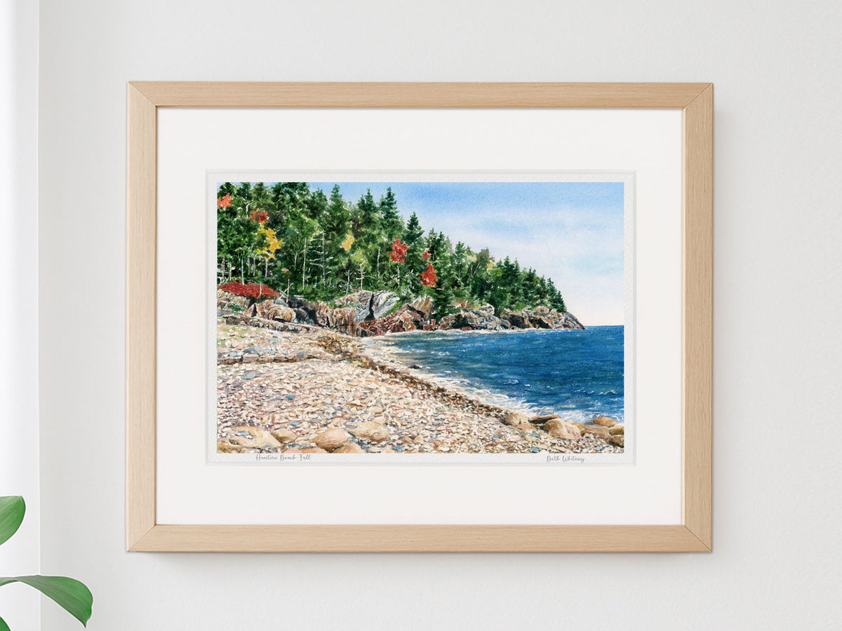 Framed watercolor print of Hunters Beach Fall, Seal Harbor, Maine, in a warm wood frame on a neutral wall.