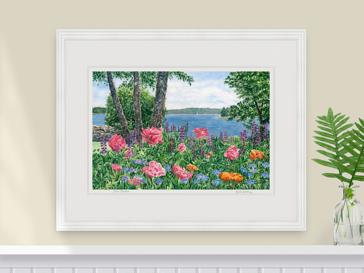 Framed watercolor print of June Garden, Friendship, Maine, in a white frame with plant styling.