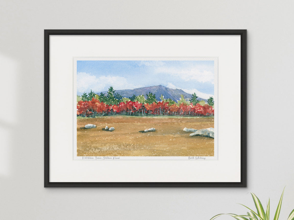 Framed watercolor print of Katahdin From the Golden Road, Baxter State Park, in a black frame on a neutral wall.