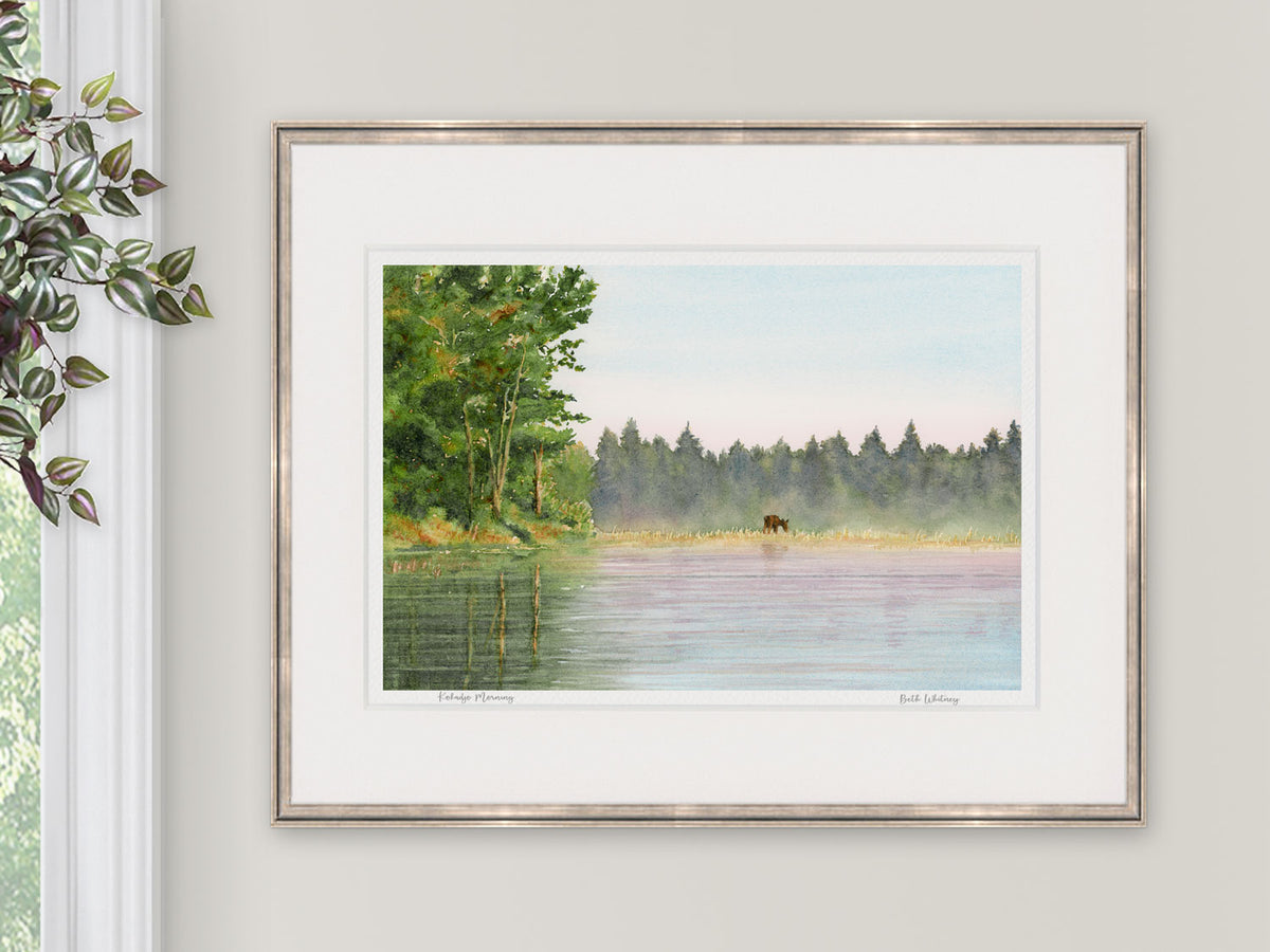 Framed watercolor print of Kokadjo Morning, Kokadjo, Maine, in a white frame with natural window light.