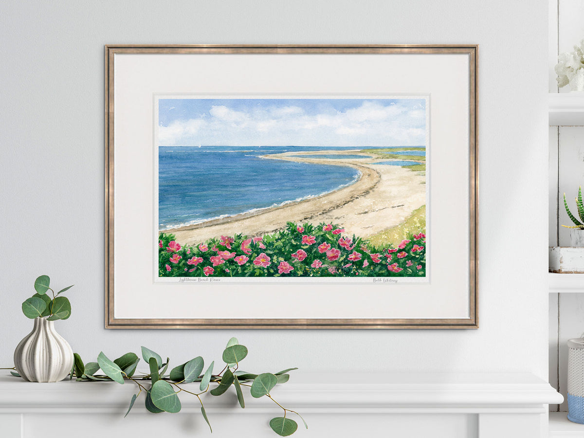 Framed watercolor print of Lighthouse Beach Roses, Chatham, Massachusetts, in a warm gold frame with plant styling.
