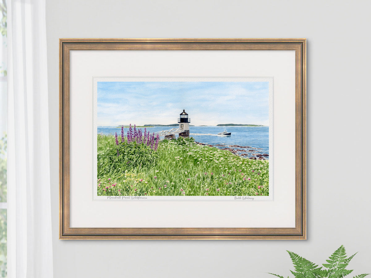 Framed Marshall Point Wildflowers print, Marshall Point Lighthouse in a gold frame with fern and window styling.