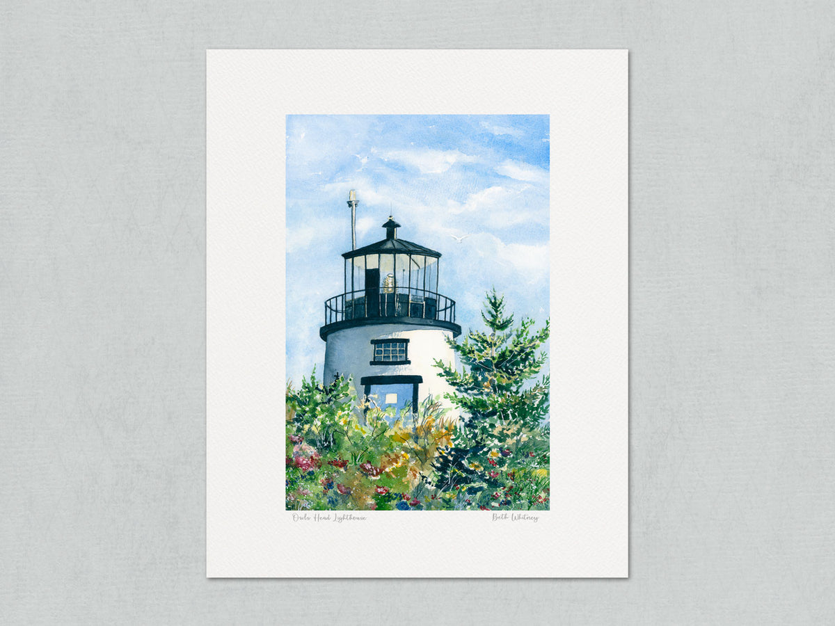 Unmatted archival watercolor print of Owls Head Lighthouse, Rockland Harbor, Maine, with artist signature and painting title, on gray background.