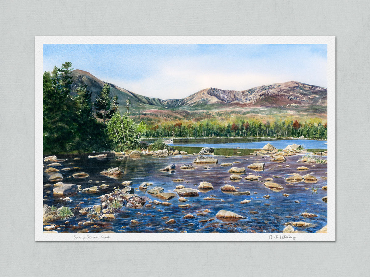 Large unmatted archival watercolor print of Sandy Stream Pond, Mt Katahdin, Baxter State Park, Maine, with artist's signature and painting title on gray background.