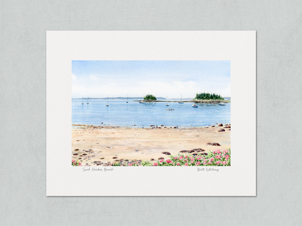 Unmatted archival watercolor print of Seal Harbor Beach in Acadia with artist Beth Whitney's signature and painting title, shown on a gray background.