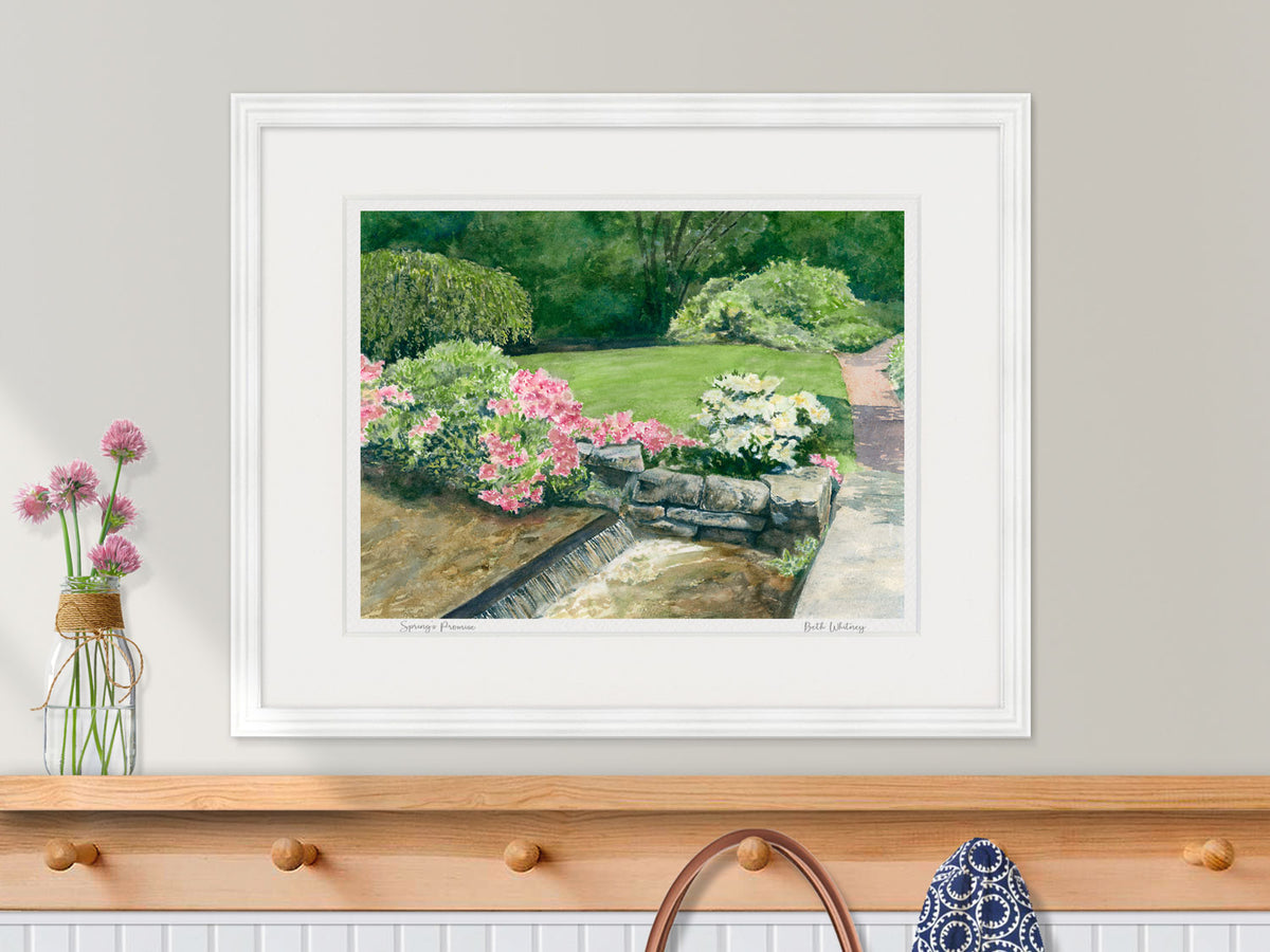 Framed watercolor print of Spring's Promise, Northeast Harbor, Maine, in a white frame in a coastal kitchen decor setting.