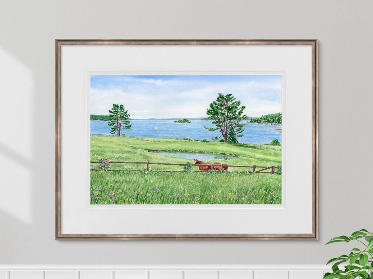 Framed original watercolor painting of Windswept View in East Blue Hill, Maine, in a simple gold frame in a coastal inspired wall decor.