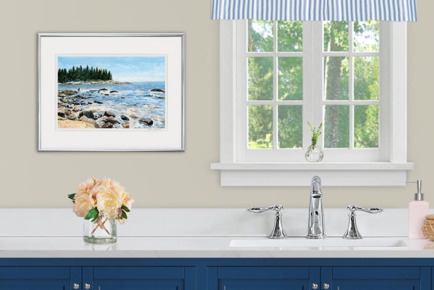 Deer Isle, Maine watercolor painting of rocky island shore and crashing ocean surf. Shown in coastal bathroom decor.