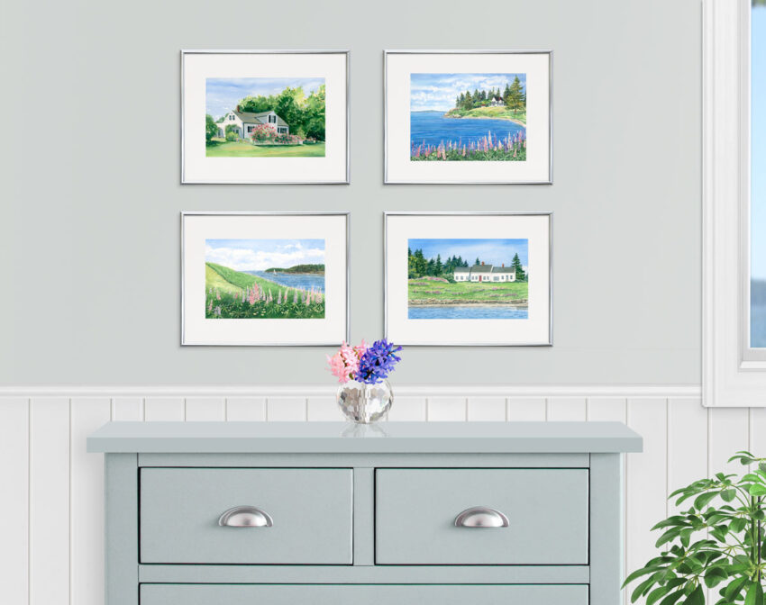 gallery wall of coastal paintings over a gray dresser