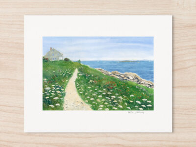 Watercolor of seaside cottage with path along the ocean, winding through grass and wildflowers