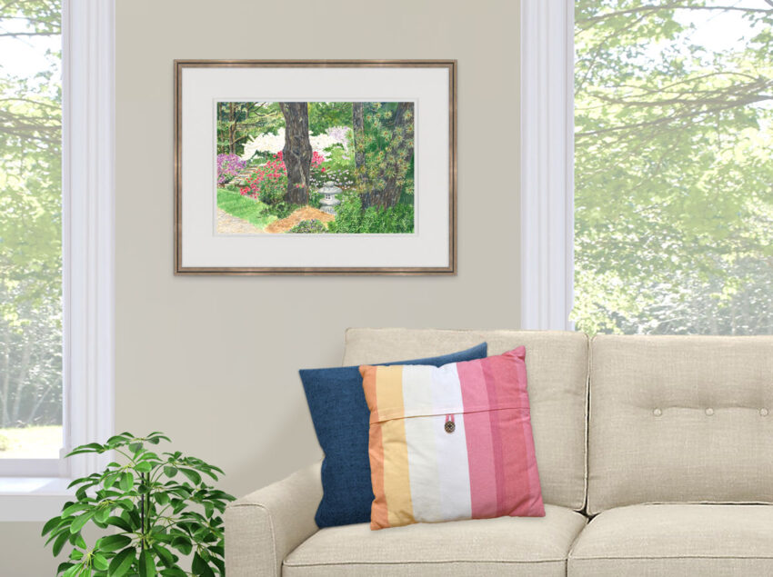 Living room with a painting of Japanese Garden with flowering trees and a stone lantern.