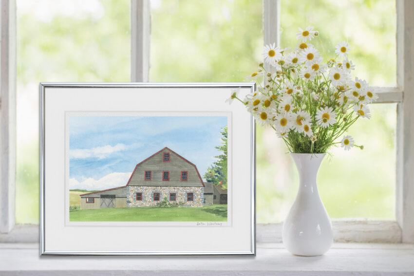 Watercolor painting of an old stone barn beside a vase of flowers.