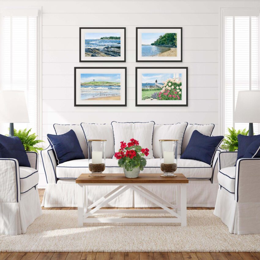 Gallery wall of Midcoast Maine seascapes in a nautical style living room